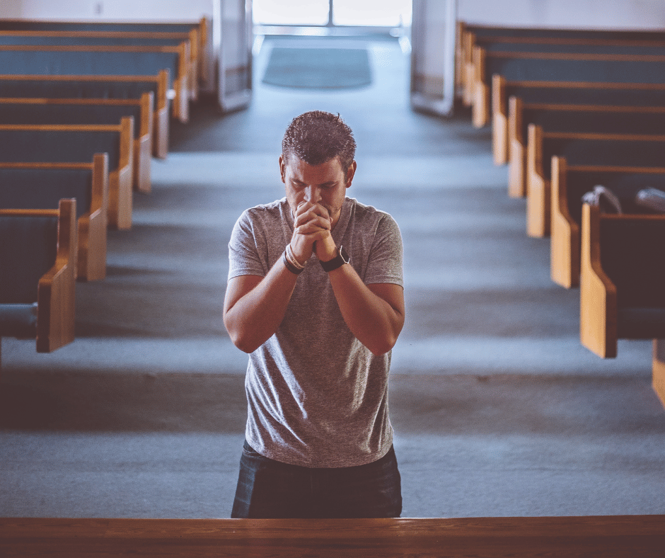 Someone praying in a church