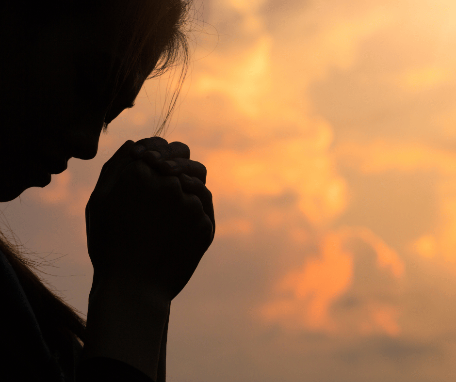 Someone saying a prayer