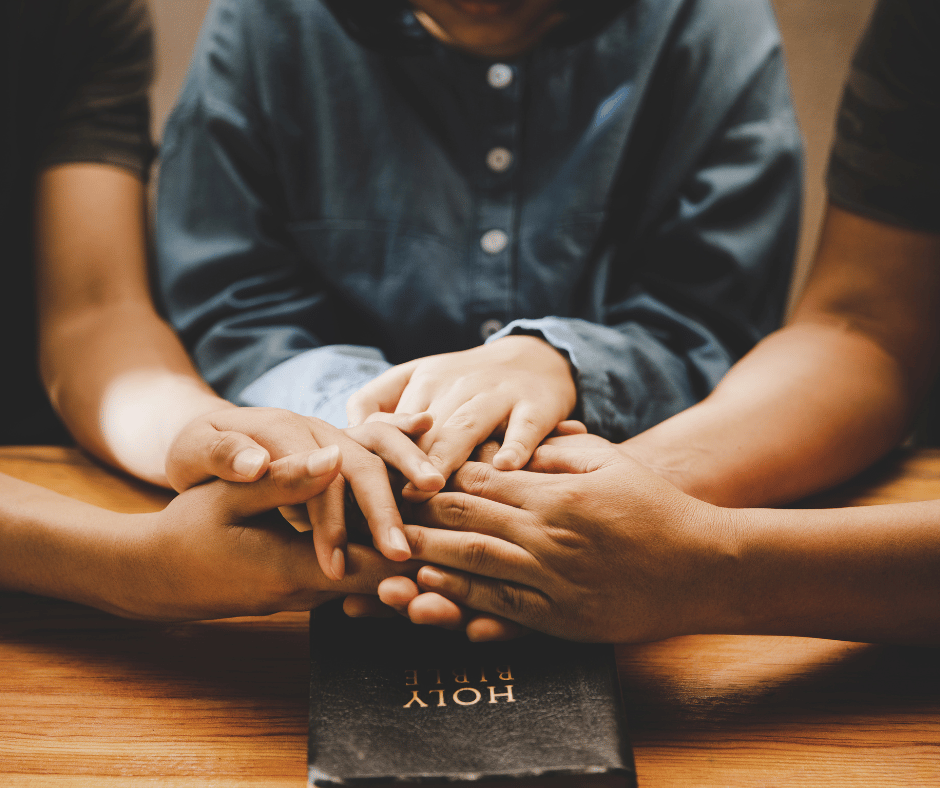 a family praying together