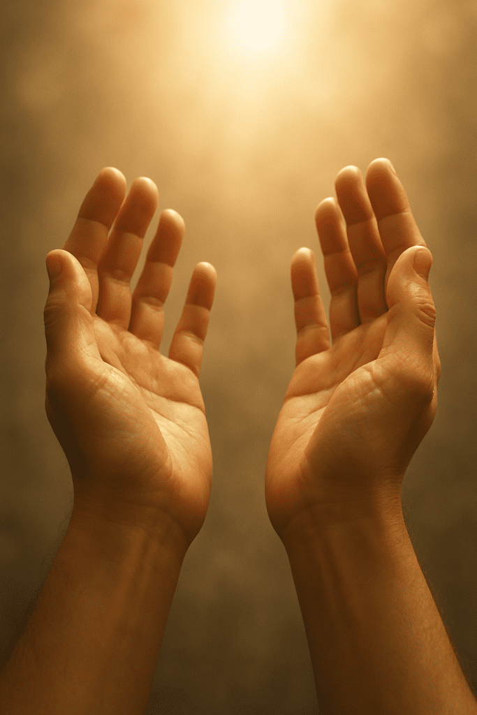 Open hands gently raised toward heaven, illuminated by soft light, symbolizing trust and surrender in The Lord's Prayer.